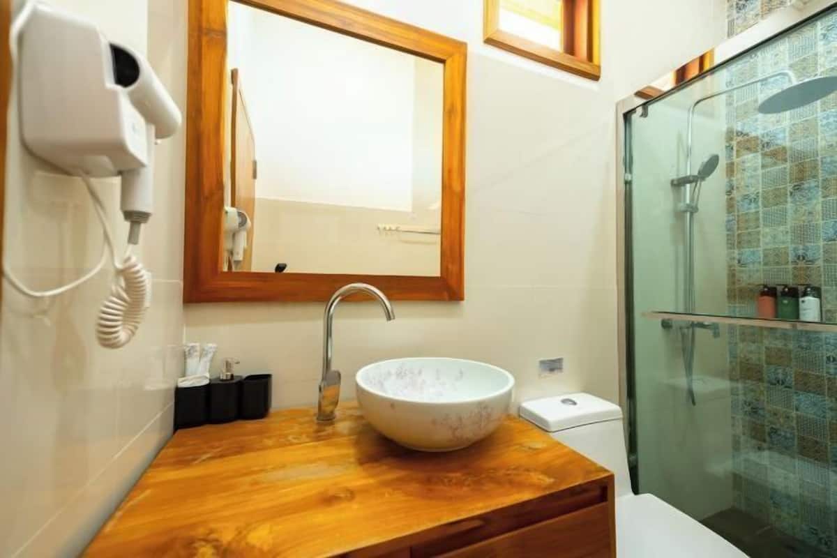 Bathroom | Shower, free toiletries, hair dryer, towels