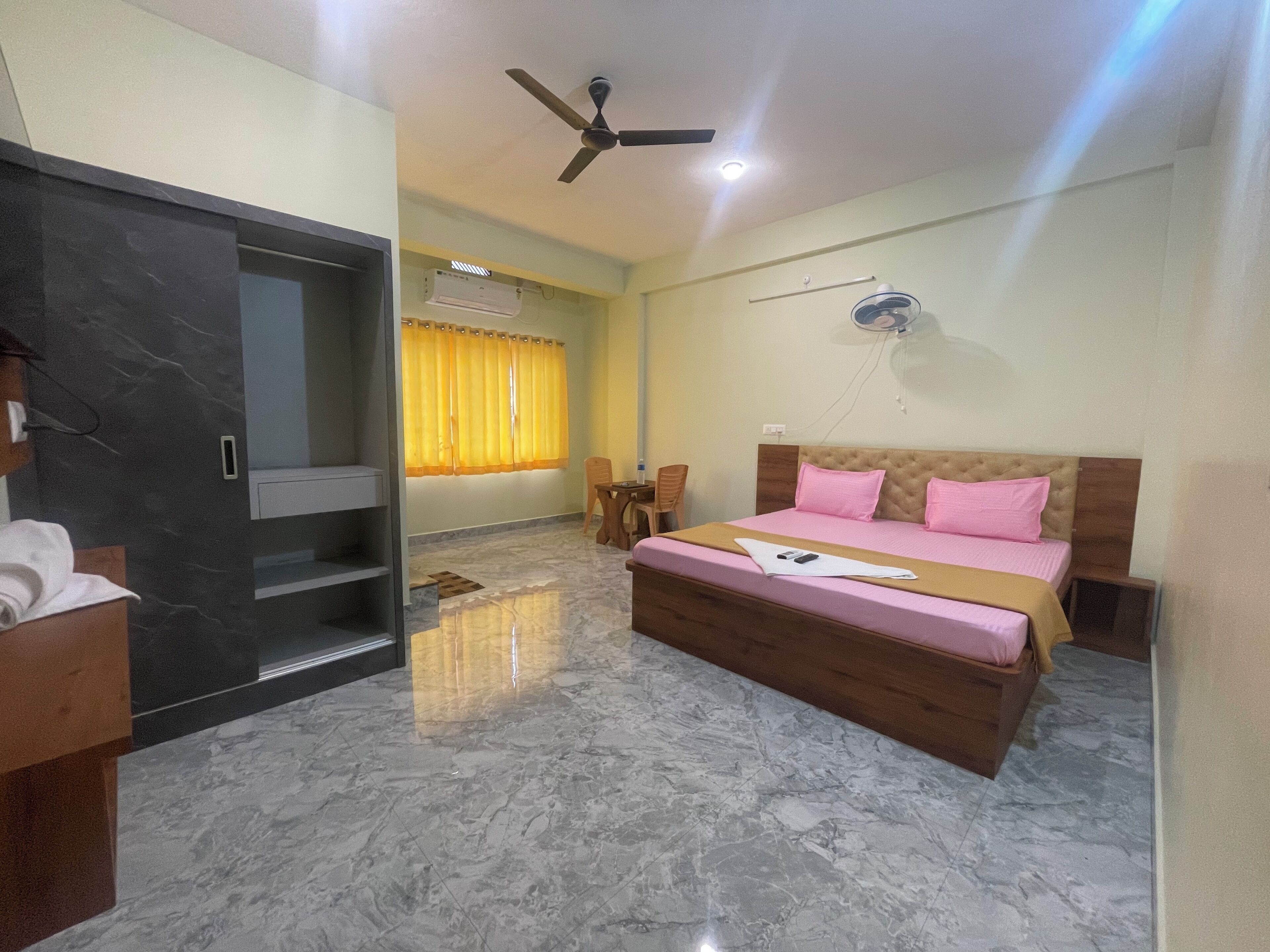 Deluxe Double Room, City View | Bathroom | Shower, slippers, towels, soap