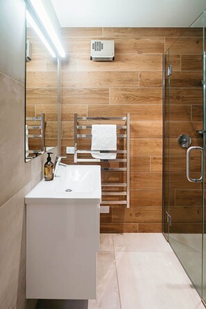 Shower, hair dryer, towels, soap