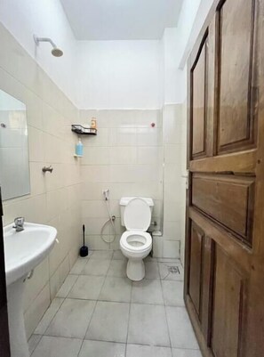 Shower, towels, soap, toilet paper