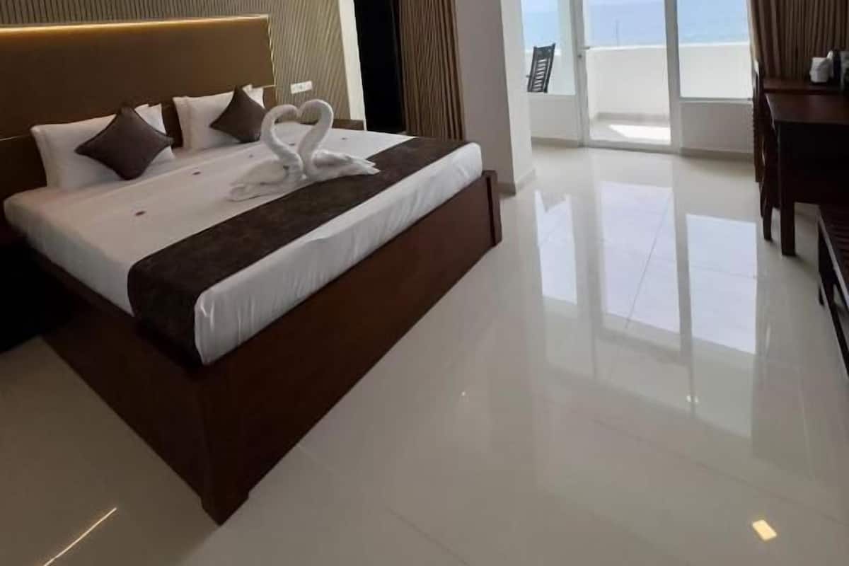 Deluxe Double Room, Balcony, Sea View | In-room safe, desk, soundproofing, iron/ironing board