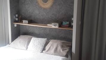 4 habitaciones, tabla de planchar con plancha, wifi y ropa de cama