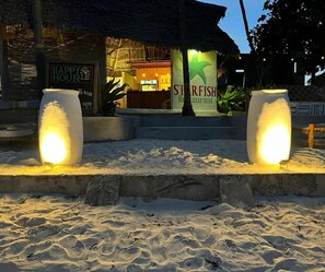 Breakfast, lunch, dinner served; beach views