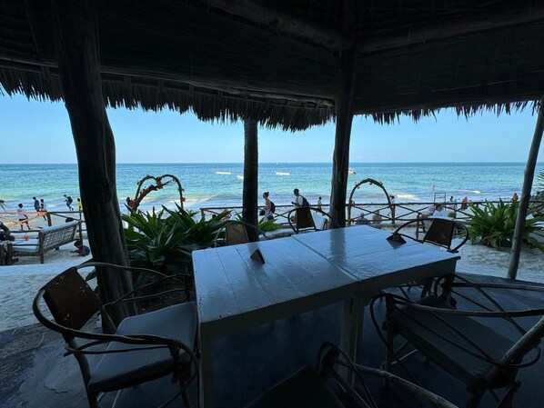 Breakfast, lunch, dinner served; beach views