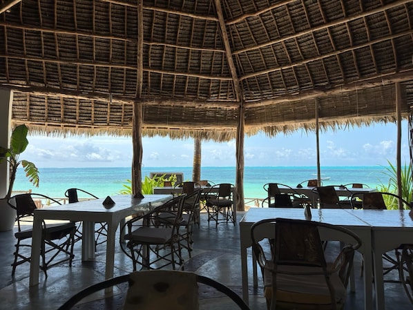 Breakfast, lunch, dinner served; beach views