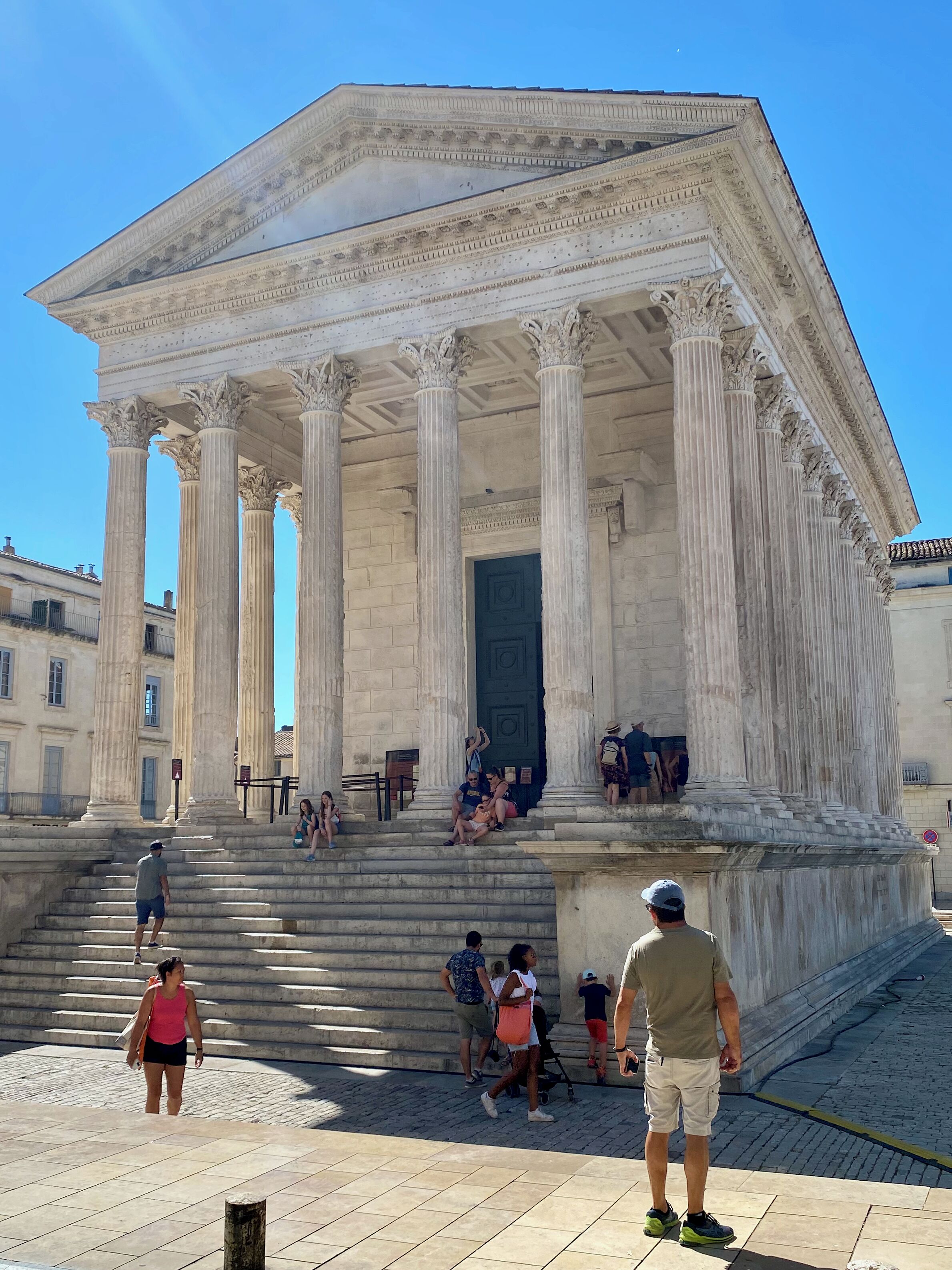 A classical building with large columns and a grand entrance.