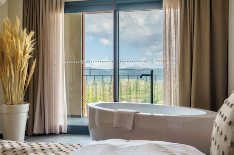 Deluxe Suite, Balcony, Mountain View | Premium bedding, memory foam beds, free minibar, in-room safe