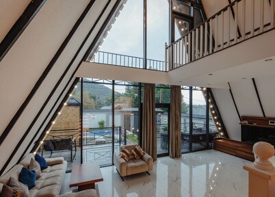 A Frame By East West