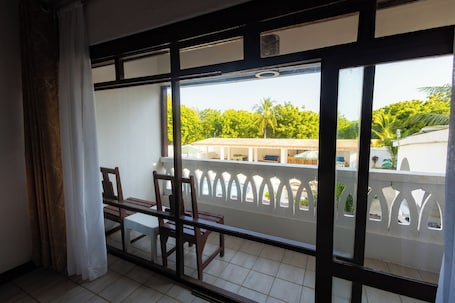 Standard Double Room, Balcony, Pool View | Bathroom | Shower, free toiletries, hair dryer, slippers