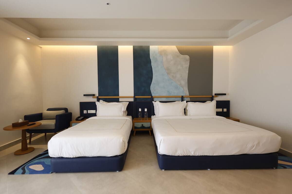 Family Triple Room, City View | In-room safe, desk, laptop workspace, soundproofing