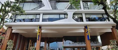 A modern building with a sign reading "Royal Bishnu."