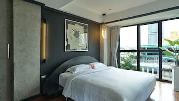 Apartment, 1 Bedroom | Minibar, in-room safe, individually decorated, individually furnished