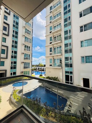 Room, 1 Bedroom, Balcony, Pool View | Pool | Outdoor pool