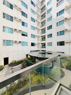 Room, 1 Bedroom, Balcony, Pool View | Property grounds