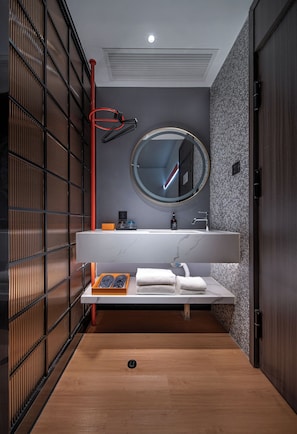 Shower, hair dryer, slippers, towels