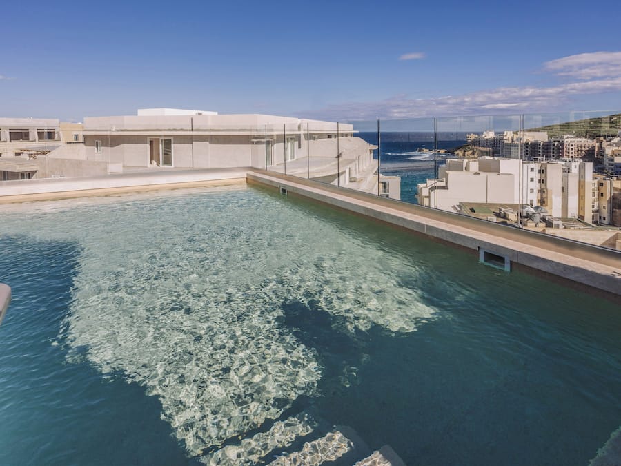 Indoor pool, outdoor pool, pool umbrellas, pool loungers