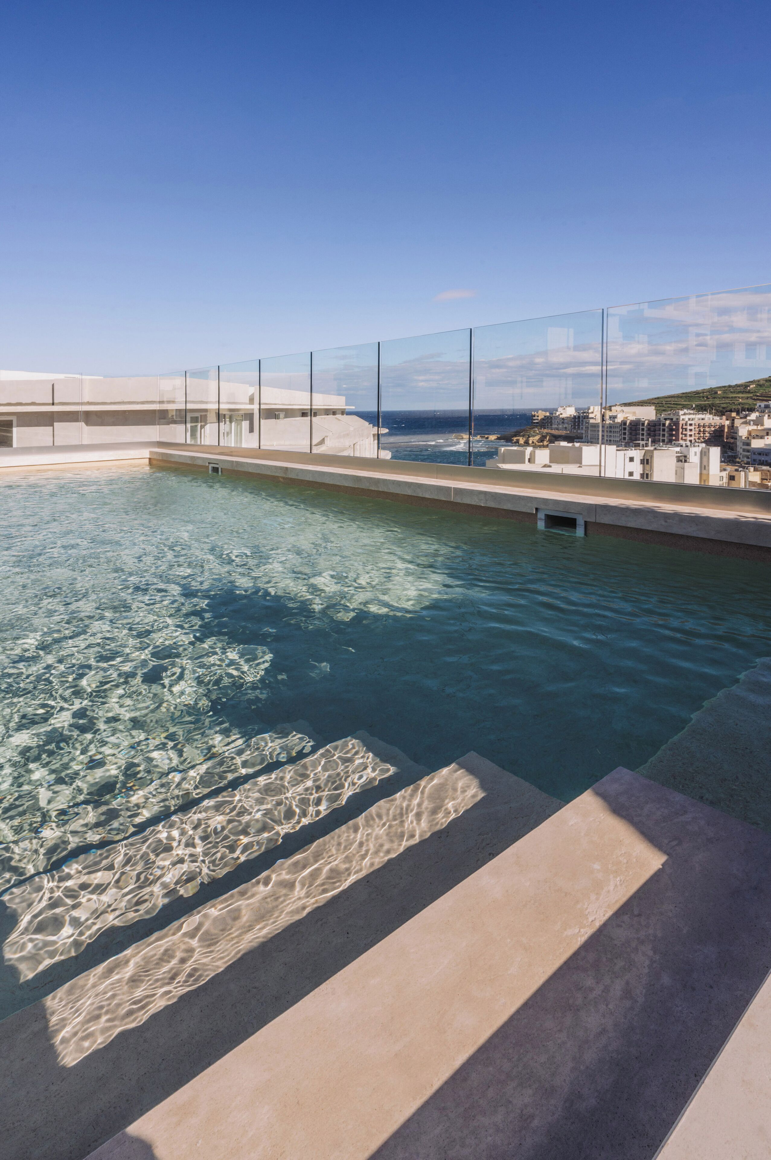 Indoor pool, outdoor pool, pool umbrellas, sun loungers