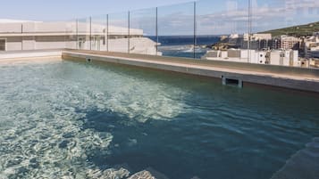 Indoor pool, outdoor pool, pool umbrellas, sun loungers