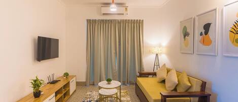 50-inch Smart TV with digital channels, books