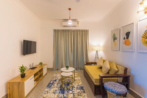 50-inch Smart TV with digital channels, books - Palm Retreat 1BHK Pool & Field Views (Calangute)