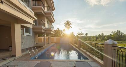 Palm Retreat 1BHK Pool & Field Views