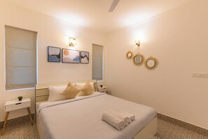 Premium bedding, blackout drapes, iron/ironing board, free WiFi - Palm Retreat 1BHK Pool & Field Views (Calangute)