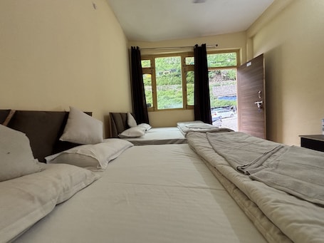 Deluxe Triple Room, Hill View | Bathroom | Shower, towels, soap, shampoo