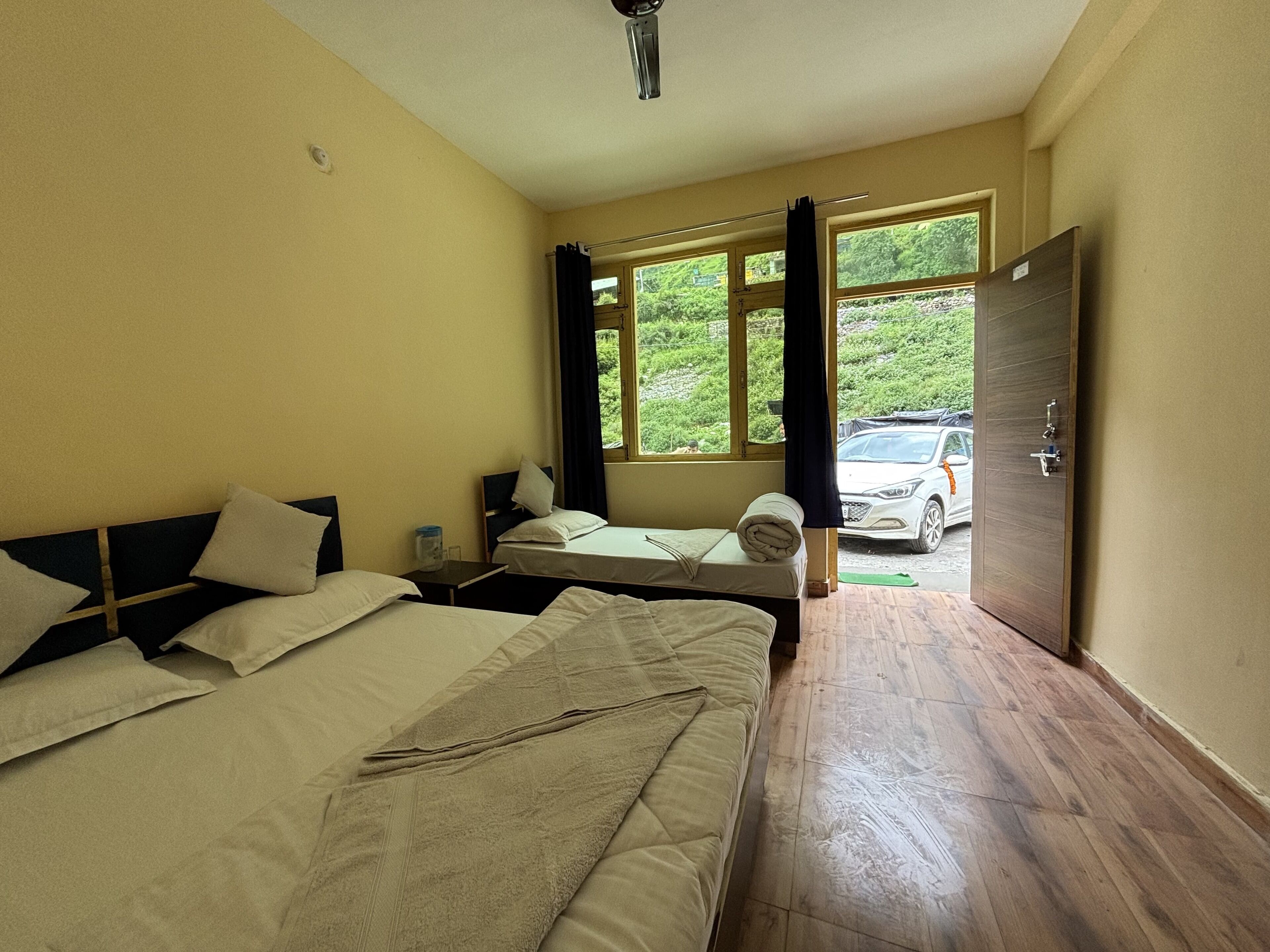 Deluxe Quadruple Room, Hill View | Desk, free WiFi
