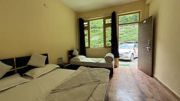 Deluxe Quadruple Room, Hill View | Desk, free WiFi