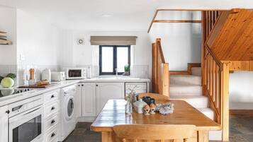 Clematis Cottage, Patio, Sea View | Private kitchen | Full-sized fridge, microwave, oven, stovetop
