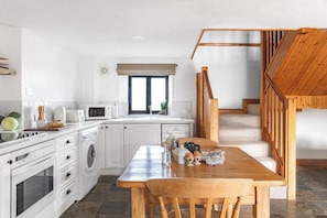 Clematis Cottage, Patio, Sea View | Private kitchen