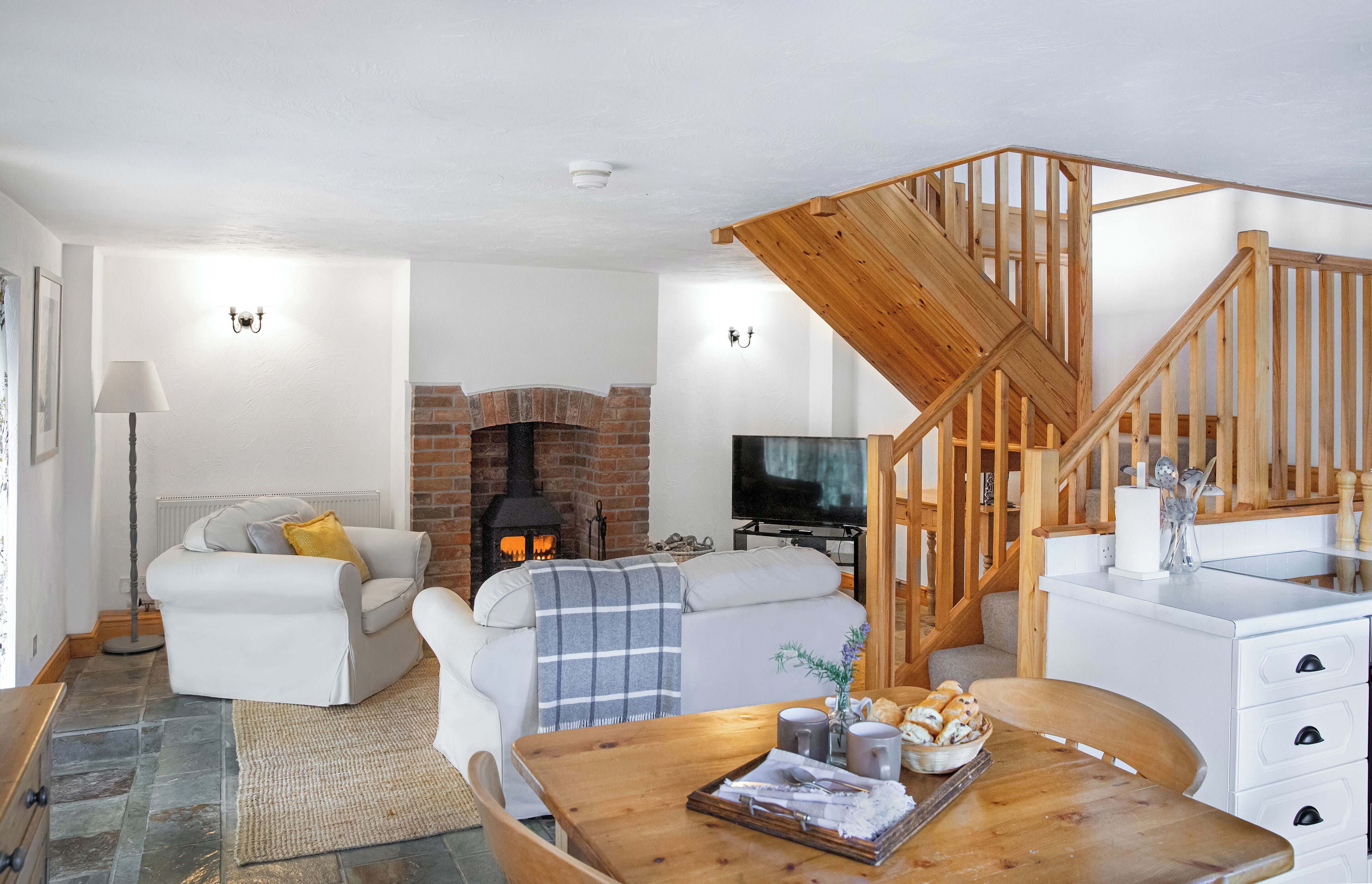 Vine Cottage, Patio, Sea View | Living area | Flat-screen TV