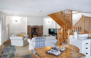 Vine Cottage, Patio, Sea View | Living area | Flat-screen TV - Downe Cottages (Bideford)