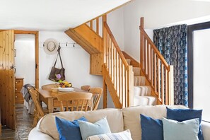 Wistaria Cottage, Patio, Sea View | Living area - Downe Cottages (Bideford)