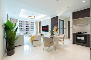 Appartement Deluxe, 1 chambre | Repas dans la chambre