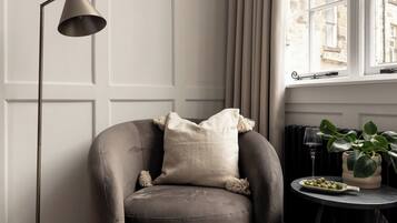 Deluxe One-Bedroom Apartment | Living area