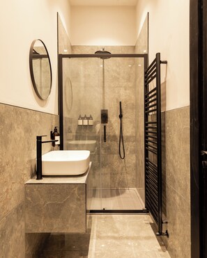 Shower, free toiletries, hair dryer, towels