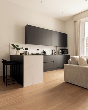 One-Bedroom Premium Apartment | Private kitchen | Fridge, oven, stovetop, cookware/dishes/utensils