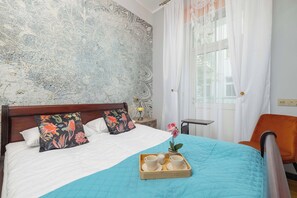 1 bedroom, desk, iron/ironing board, travel cot