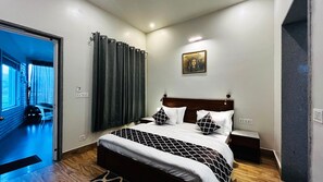 デラックス ダブルルーム ガーデンビュー | WiFi (無料)、ベッドシーツ