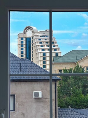 Habitación familiar, vista al jardín | Wifi gratis