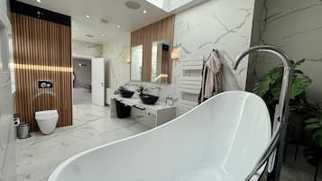 Shower, hair dryer, slippers, towels