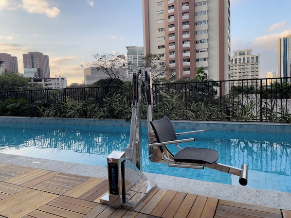 Outdoor pool, open 8:00 AM to 10:00 PM, pool umbrellas, sun loungers