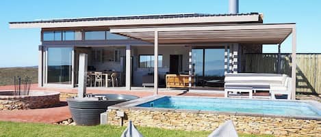 Executive chalet, balkon, uitzicht op bergen | Een laptopwerkplek, gratis wifi, beddengoed