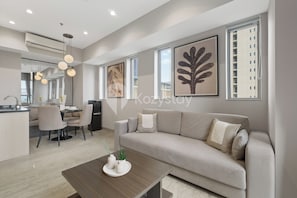 Apartment, 2 Bedrooms, City View | Living area | 43-inch Smart TV with cable channels, Netflix, streaming services - Orlani by Kozystay - BSD (Pagedangan)