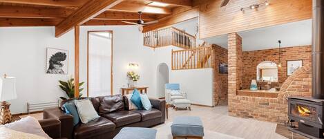 Smart TV, fireplace, books, stereo