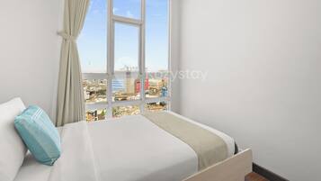 Apartment, 3 Bedrooms, City View | Iron/ironing board, free WiFi