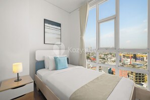 Apartment, 3 Bedrooms, City View | Iron/ironing board, free WiFi
