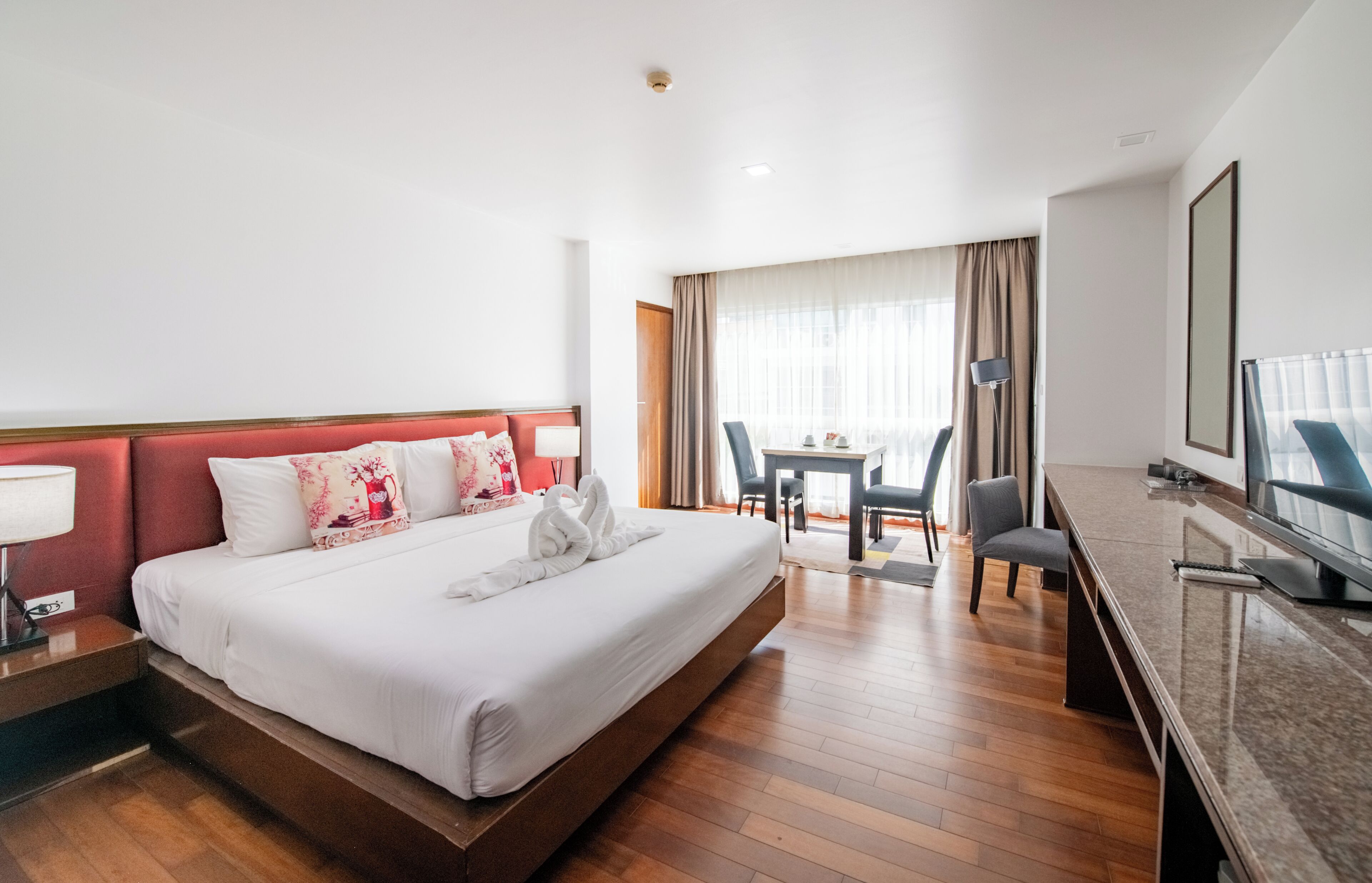 Deluxe Plus Room | In-room safe, desk, laptop workspace, blackout curtains