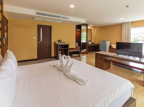 Junior Room, Balcony, City View | In-room safe, desk, laptop workspace, blackout drapes